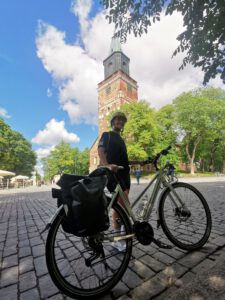 A women, bike and Turku cathedral 