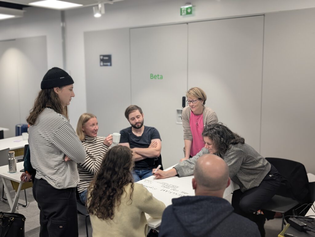 Participants discussing working areas.