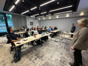 Presenter speaking to seminar crowd