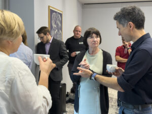 Group of people discussing on seminar break