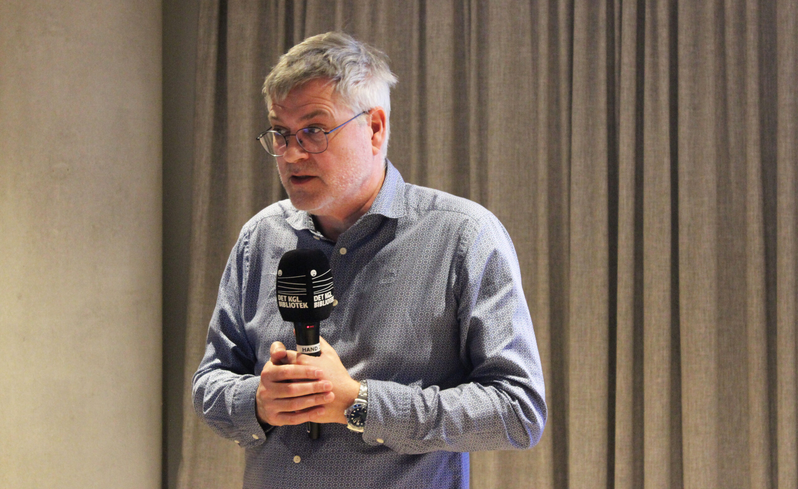 Thomas Christensen giving a presentation to an audience