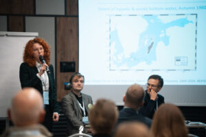 Audience listening the presentation at the Annual Forum given by Aleksandra Najda, Business Manager at the Race For The Baltic.