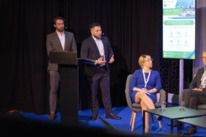 Tomasz Laskowicz and Oskar Wanat presenting the Polish Circular Ports pilot at Europe Forum 2026.